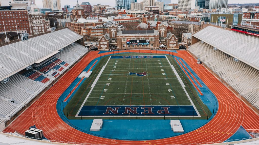 A wide view of the Penn football field, representing the legacy of the best high school football players in PA.