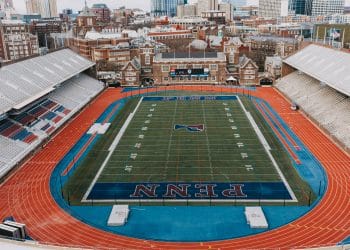 A wide view of the Penn football field, representing the legacy of the best high school football players in PA.