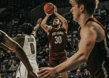 A basketball player in action, representing the Best Indiana High School Basketball Players on the court during a competitive game.