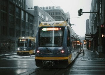 A metro train in Minneapolis, home to some of the Best Basketball Players From Minnesota, captured on a snowy day in the city.