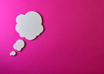 A pink/fuchsia background with a thought image, representing the Top 10 Best Quotes From Basketball Players