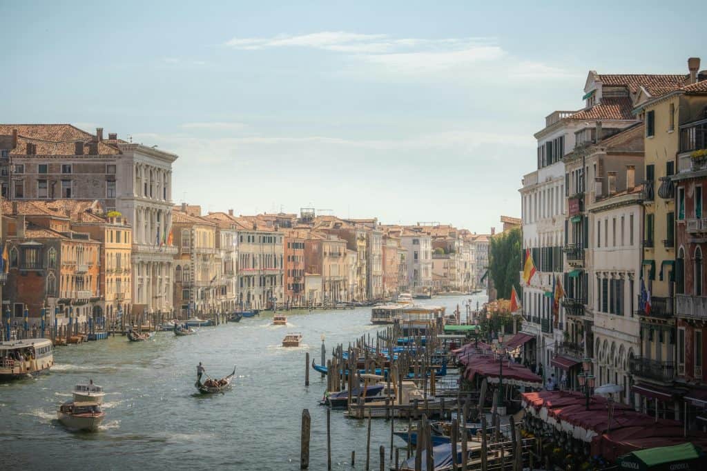 A scenic view of a Venetian canal, symbolizing the heritage of the Best Italian Baseball Players and their cultural roots.