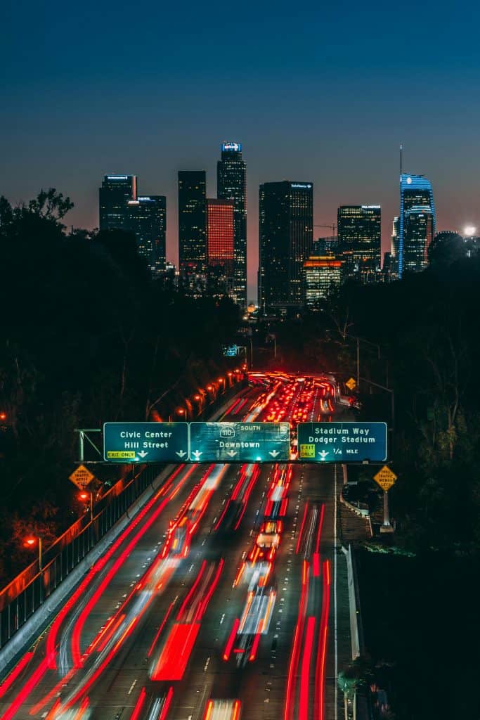Night view of Los Angeles city lights and freeway, symbolizing the legacy of the Best USC Basketball Players of All Time who thrived in this city.