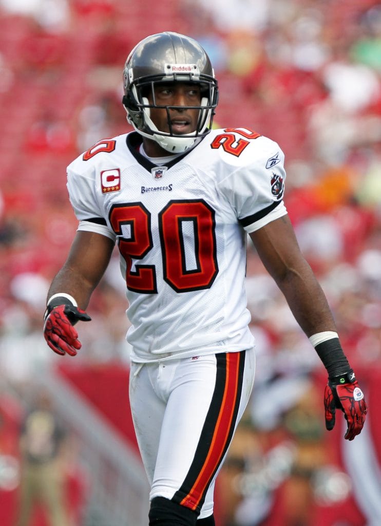 Tampa Bay Buccaneers defensive back Ronde Barber walking on the field in uniform and helmet.