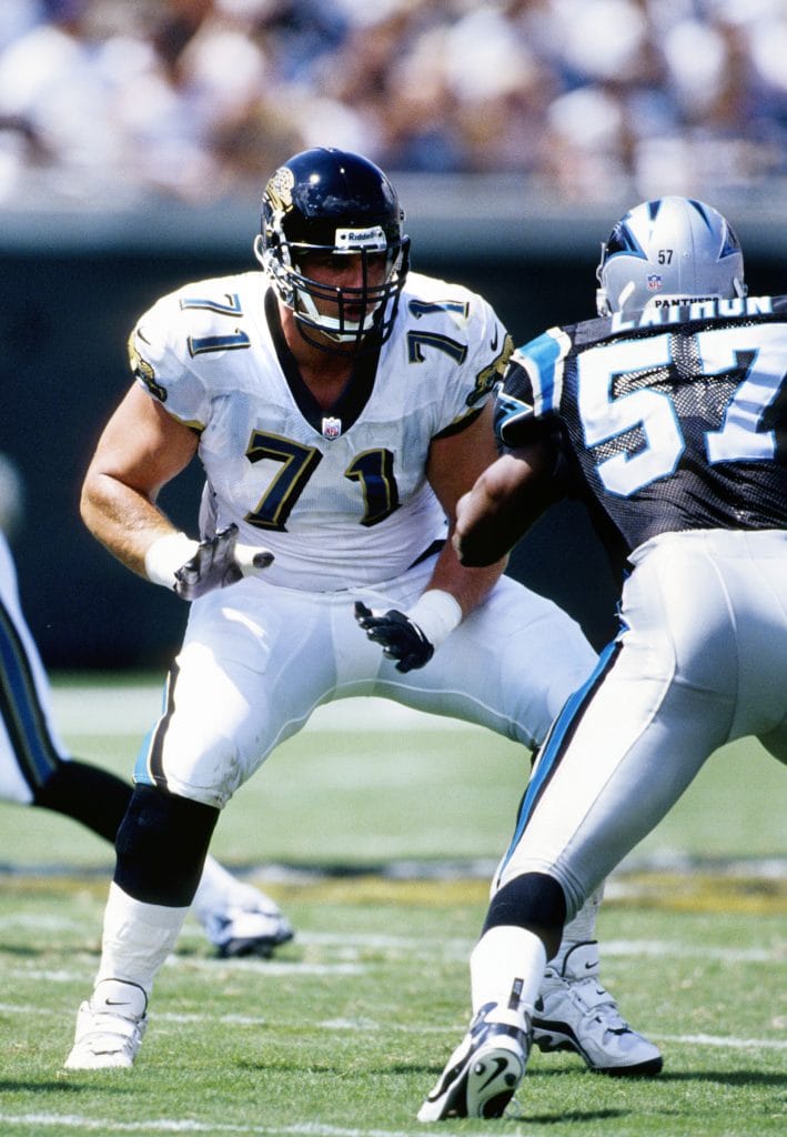 Jaguars tackle Tony Boselli engages in blocking during a game against the Panthers.
