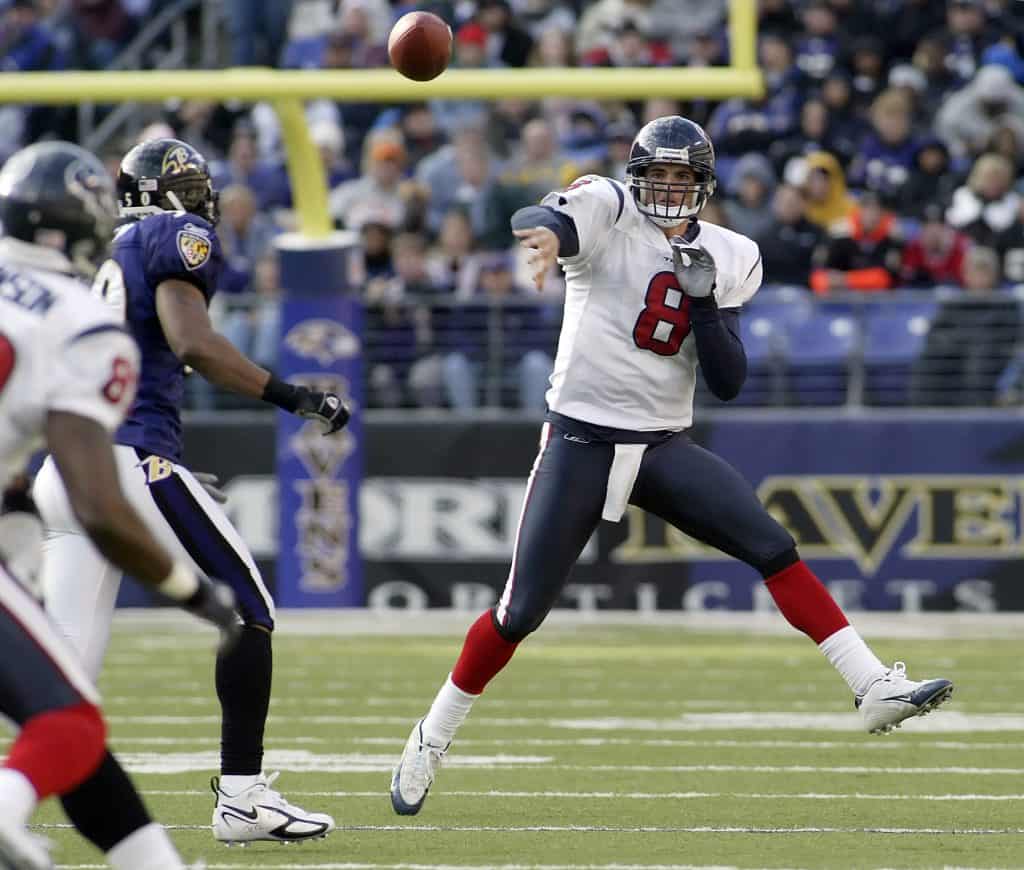 David Carr throwing a pass for the Houston Texans in a game against the Baltimore Ravens.