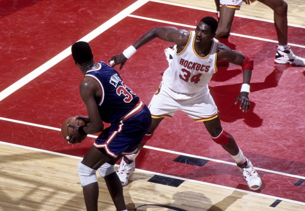 Hakeem Olajuwon defending Patrick Ewing in a classic matchup.