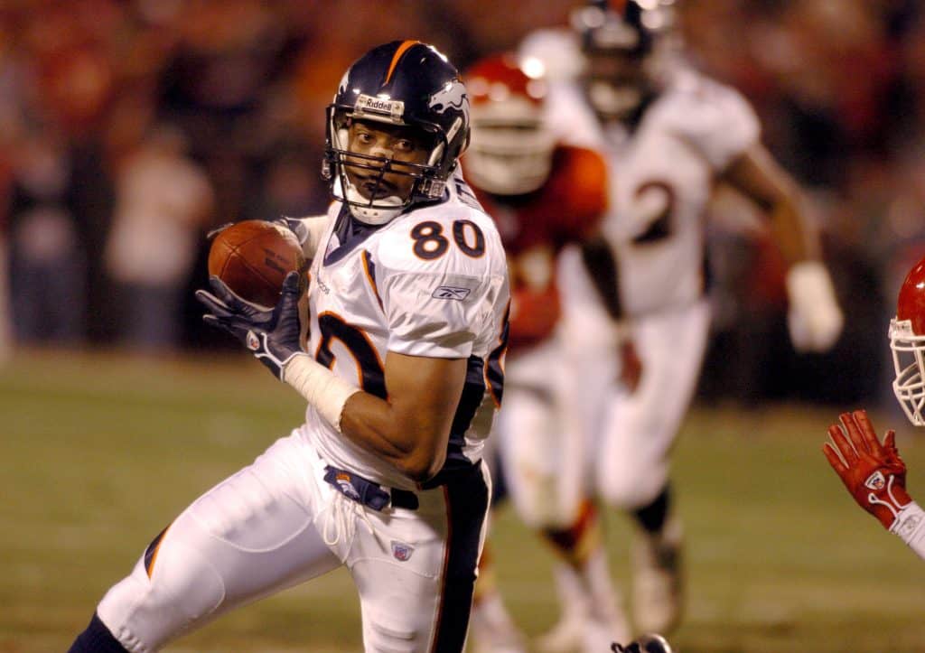 Rod Smith catching a pass for the Denver Broncos during a game against the Kansas City Chiefs.