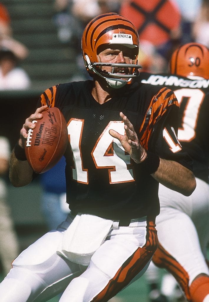 Ken Anderson of the Cincinnati Bengals dropping back to pass during an NFL game.
