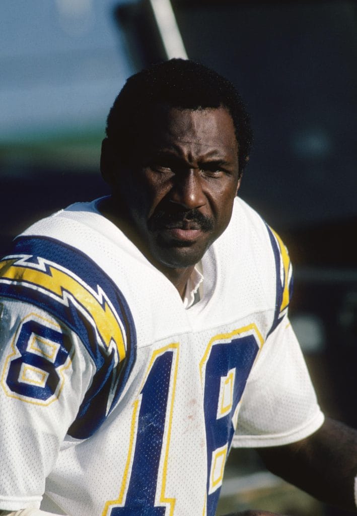 Charlie Joiner of the San Diego Chargers, wearing jersey number 18, captured in a close-up during an NFL game.