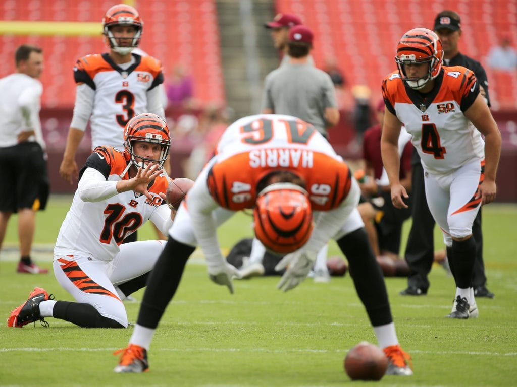 Clark Harris, one of the Top 10 White Long Snappers of All Time, snapping the ball during warmups for the Cincinnati Bengals.