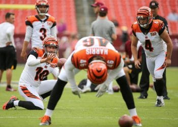Clark Harris, one of the Top 10 White Long Snappers of All Time, snapping the ball during warmups for the Cincinnati Bengals.