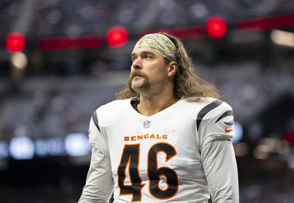 Clark Harris, one of the top white NFL players and long snappers, wearing his Cincinnati Bengals uniform on the field.