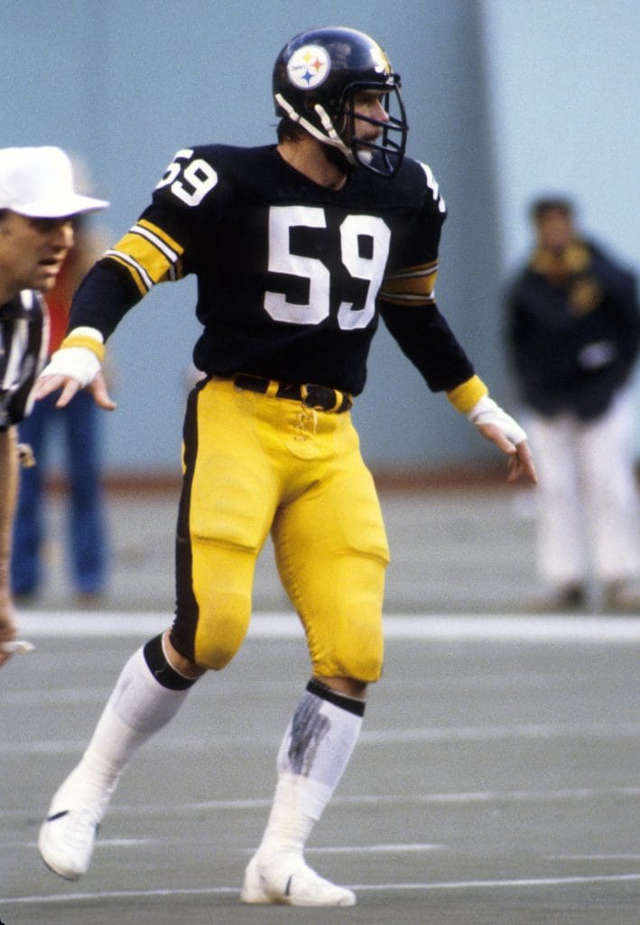 Jack Ham in position during a game wearing his Pittsburgh Steelers uniform.