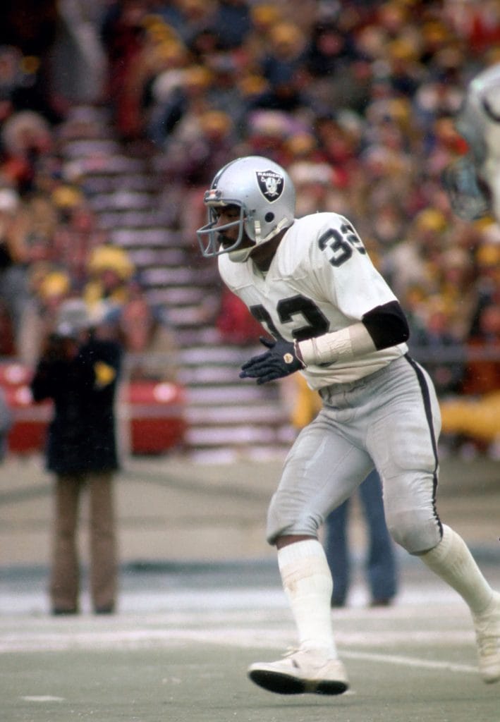 Jack Tatum in action for the Raiders, showcasing his iconic defensive presence and hard-hitting style that defined his legacy.