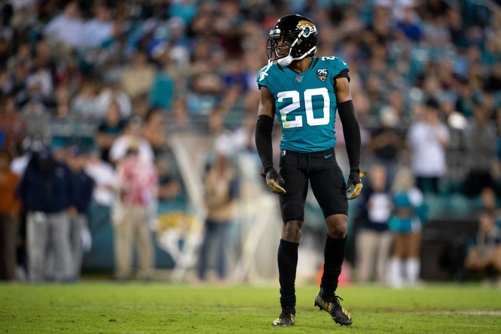 Jacksonville Jaguars cornerback Jalen Ramsey surveying the field during a defensive play in an NFL game.