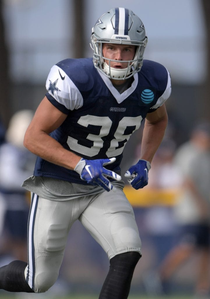 Jeff Heath, a standout white NFL player, during a Cowboys training session.
