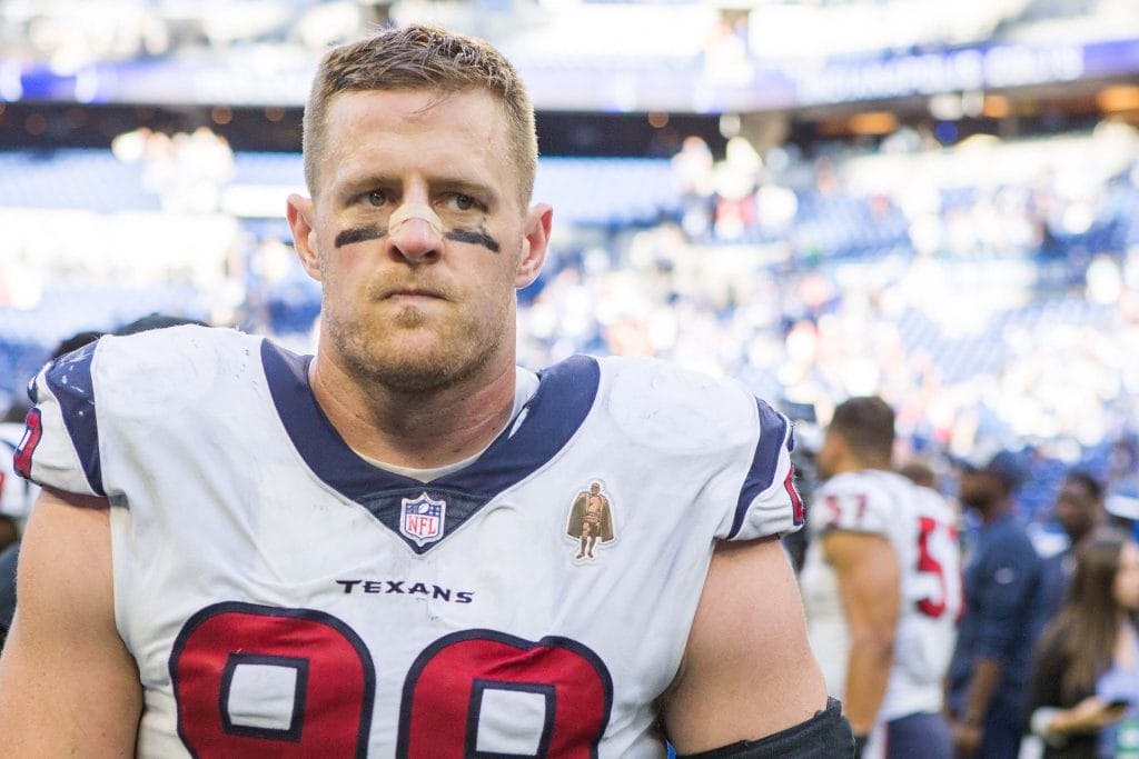 J.J. Watt looking focused after a game, wearing his Houston Texans jersey.