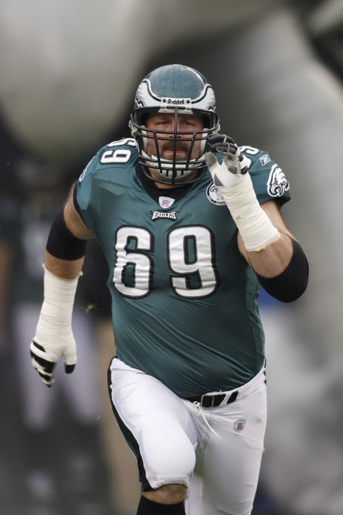 Jon Runyan in action for the Eagles, representing strength and skill for the top 10 white right tackles of all time.