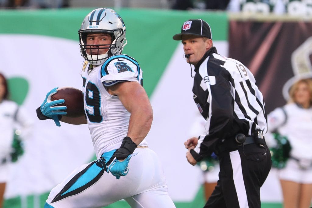 Luke Kuechly of the Carolina Panthers running with the football during a game.