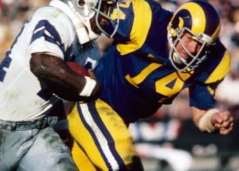 Merlin Olsen, featured in the top 10 white defensive tackles of all time, playing for the Los Angeles Rams during his Hall of Fame career.