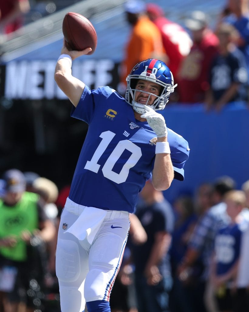 New York Giants quarterback Eli Manning warming up with a throw during pregame.