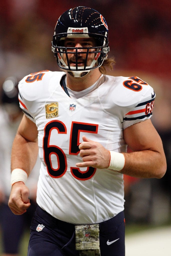 Patrick Mannelly, considered one of the best white NFL players, jogging onto the field for the Chicago Bears.