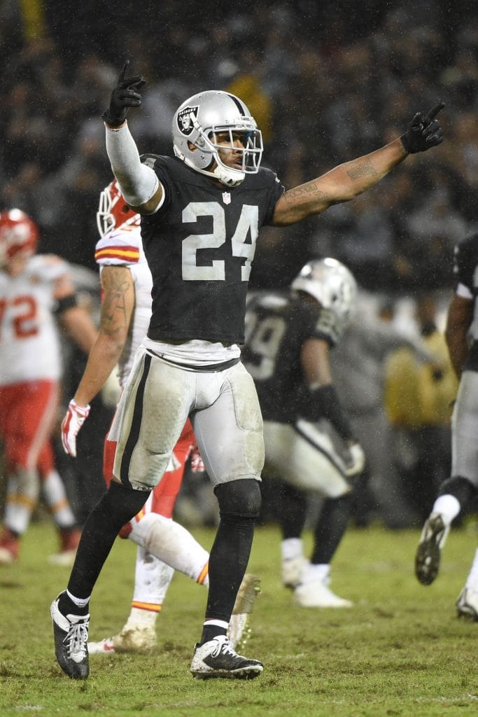 Charles Woodson of the Oakland Raiders celebrating a defensive stop in a game against the Kansas City Chiefs.