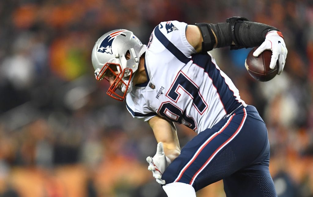 Rob Gronkowski celebrates a touchdown catch in a New England Patriots game.