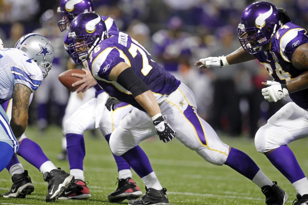 Steve Hutchinson, one of the Top 10 White Left Guards of All Time in action for the Minnesota Vikings during an NFL playoff game.