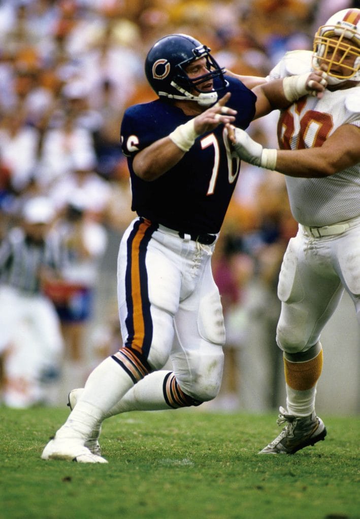 Steve McMichael, one of the best white NFL players, battles in the trenches during his career with the Chicago Bears.