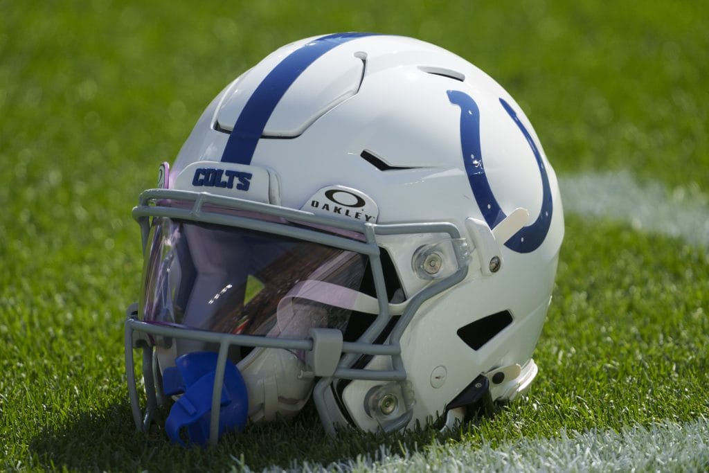 Indianapolis Colts helmet resting on the field, representing the Top 10 Indianapolis Colts of All Time.