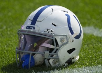 Indianapolis Colts helmet resting on the field, representing the Top 10 Indianapolis Colts of All Time.