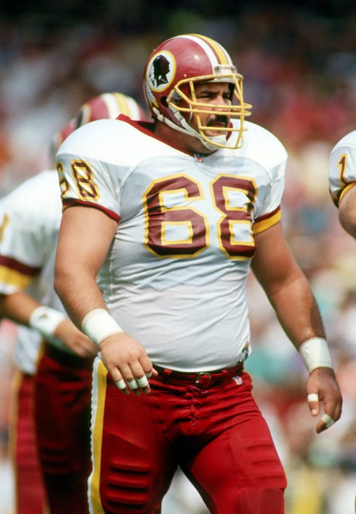 Russ Grimm, one of the Top 10 White Left Guards of All Time, representing the Washington Redskins during an NFL game.