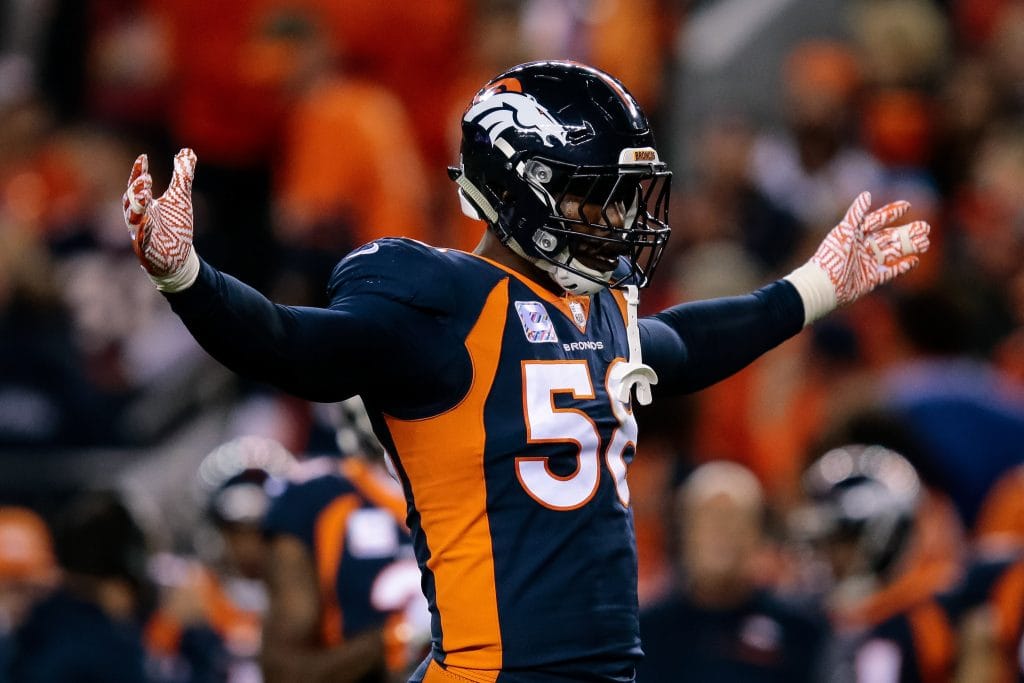 Von Miller of the Denver Broncos celebrates after a key defensive play.