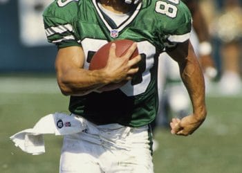 Wayne Chrebet returning a punt in his New York Jets uniform, representing one of the Top 10 White Punt Returners of All Time.