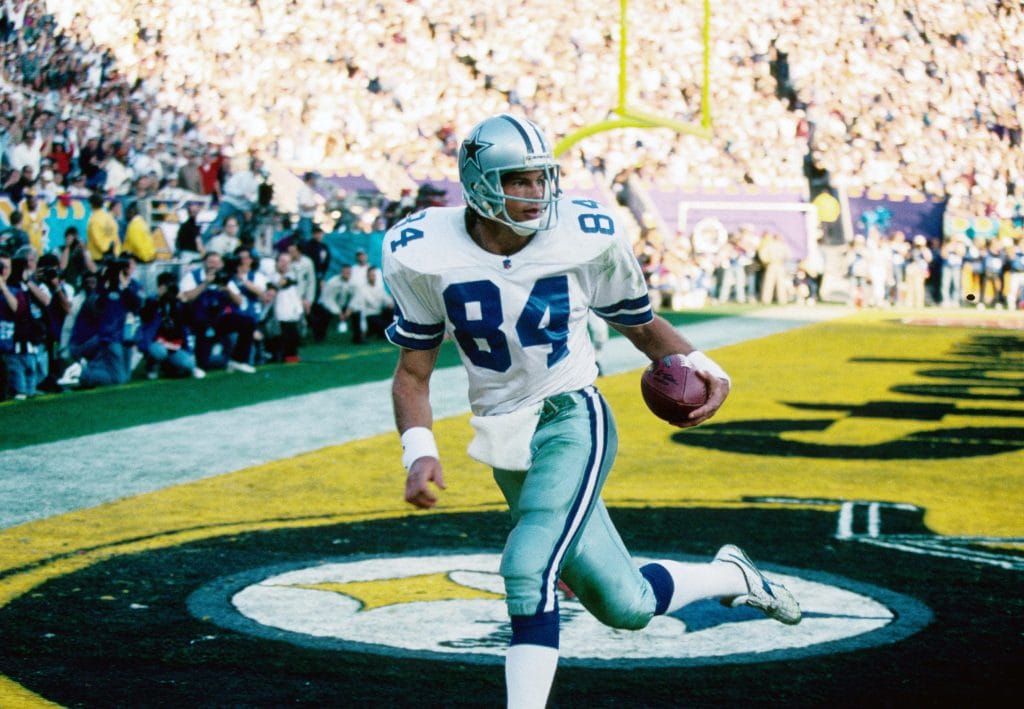 Jay Novacek, one of the best white tight ends in NFL history, scores a touchdown for the Dallas Cowboys during a Super Bowl.