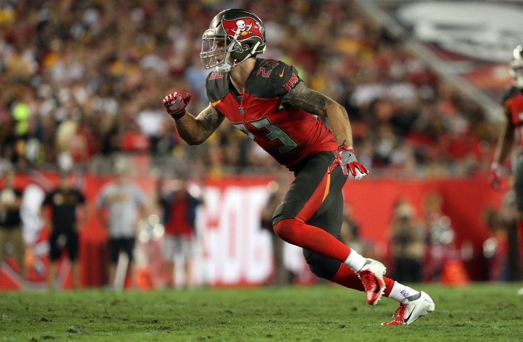 Chris Conte of the Tampa Bay Buccaneers prepares to defend, recognized as one of the best white safeties and white NFL players.