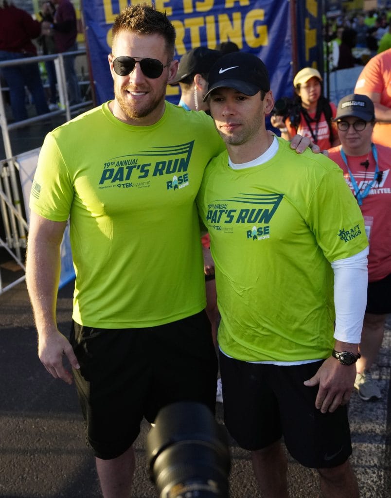J.J. Watt participating in Pat's Run, symbolizing his philanthropic side as one of the best white football players of all time.
