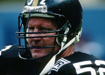 Mike Webster (#52), the heart of the Steelers’ offensive line, epitomizes greatness as one of the best NFL white centers in history.