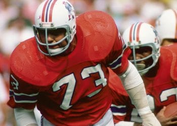John Hannah in action, a key figure on the Top 10 White NFL Offensive Guards of All Time list, showcasing his dominance with the New England Patriots.