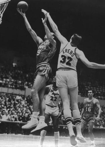 Bob Pettit drives to the basket against the Los Angeles Lakers in a vintage NBA game.