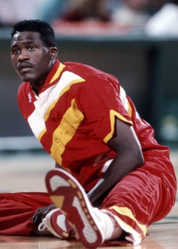Dominique Wilkins stretching in Hawks warmup gear – Top 10 Small Forwards of All Time