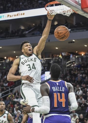 Giannis Antetokounmpo throwing down a dunk vs. the Suns, representing the new generation in the Top 10 Power Forwards of All Time
