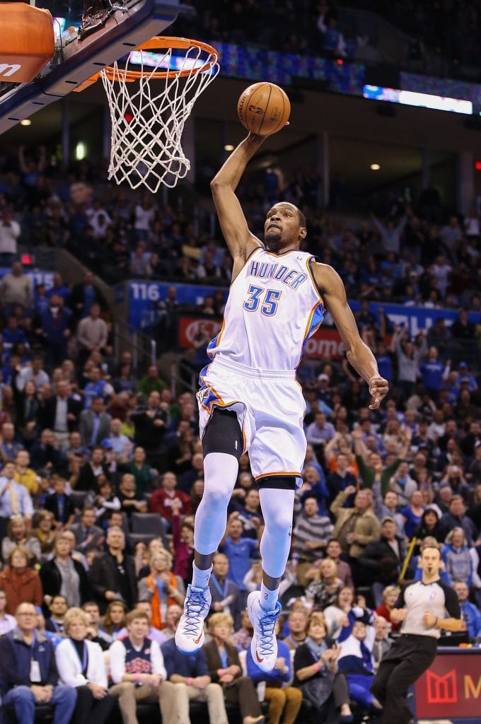 evin Durant of the Thunder elevates for a dunk during a home game.