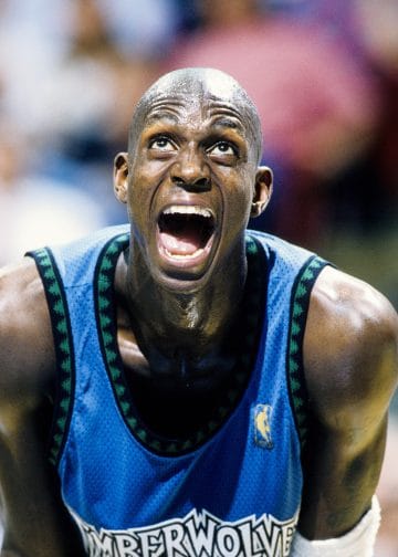 Kevin Garnett screaming during a Timberwolves game, representing the Top 10 Power Forwards of All Time