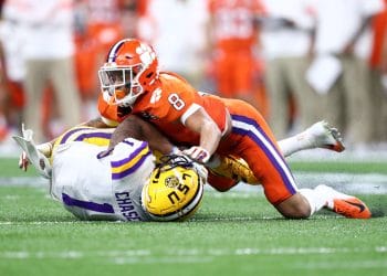 AJ Terrell tackles Ja'Marr Chase during the national championship, featured in the Top 10 Cornerbacks Who Played 7v7 Football of All Time