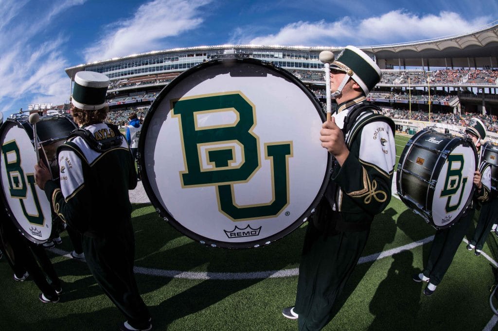 Baylor band preps the crowd during a home game on the baylor football schedule.