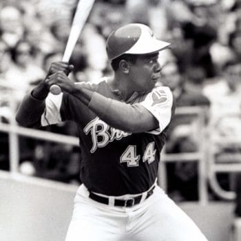 Hall of Fame Black baseball players Hank Aaron at bat in an Atlanta Braves uniform.