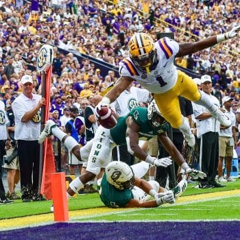 LSU wide receiver Ja'Marr Chase dives toward the pylon for a touchdown.